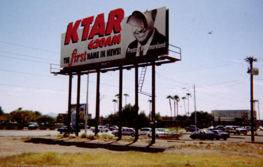 billboard with head off